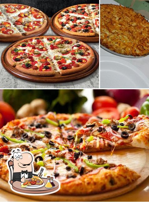 Experimente pizza no Lanchonete & Pizzaria Copas Verdis