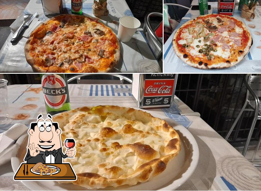 Choisissez des pizzas à Pizzeria Al Tubino