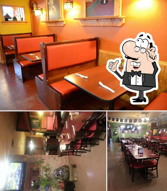 Take a seat at one of the tables at El Chile Poblano Mexican Restaurant