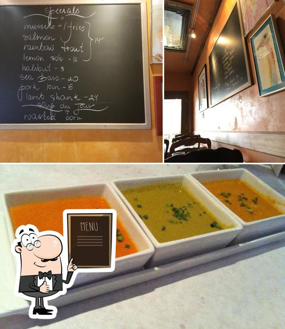This is the photo displaying blackboard and food at Vincent Market Bistro