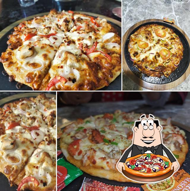 Get pizza at Reedbuck Cafe & Restaurant