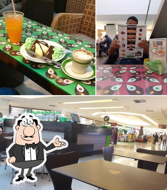 Sente em uma das mesas no Deltaexpresso - Shopping Recife - Loja (Próximo ao Cinema)
