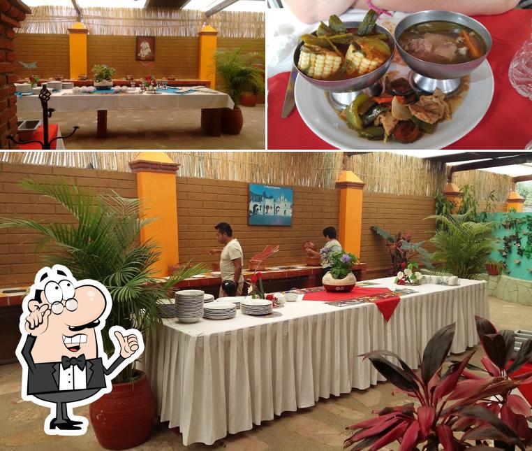 The picture of interior and food at Los Huípíles Restaurant Buffet Bar