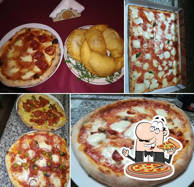 Prenditi una pizza a Pizzeria Pub 360°