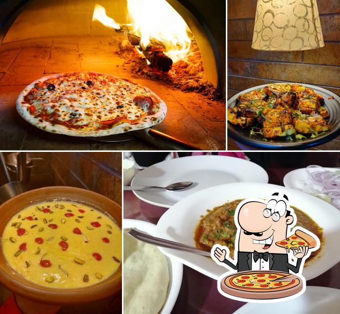 Try out pizza at Naushijaan Restaurant - Large Range Of Awadhi Kebab