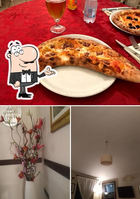 La foto della interni e pizza di Araba Fenice Ristorante Pizzeria