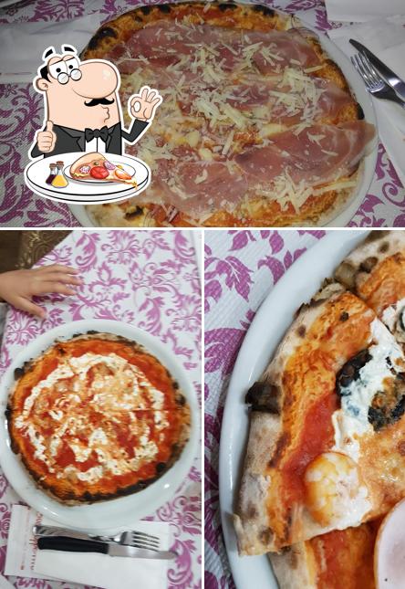 Prenditi una pizza a Pizzeria pomo d'oro