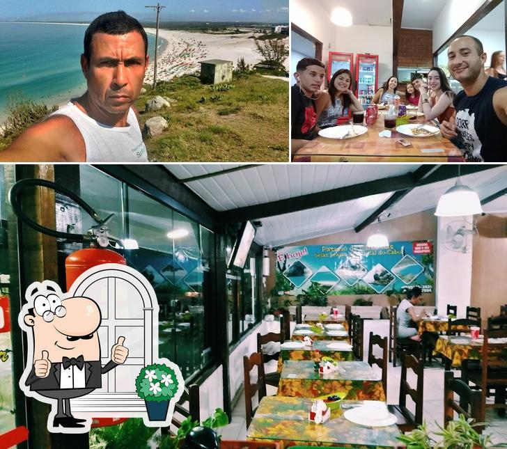 A foto do BOM PALADAR - Pizzaria & Restaurante’s exterior e mesa de jantar