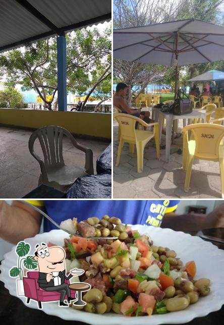Confira a ilustração ilustrando interior e comida no Balneário, Restaurante e Pousada 'O Cantinho da Patricia e Tony'