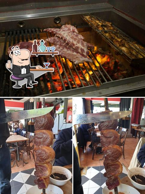 Questa è la foto che presenta la interni e frutti di mare di Le Café du Stade
