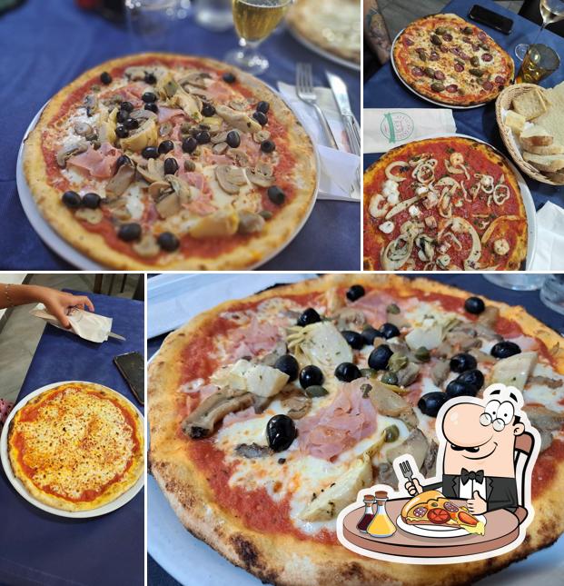 Prenditi una pizza a Ristorante, Pizzeria e Appartamenti Renzo & Rita