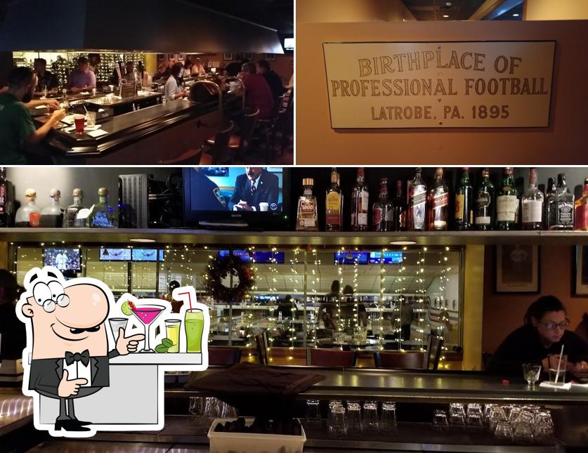 The photo of bar counter and interior at Touchdown Club II