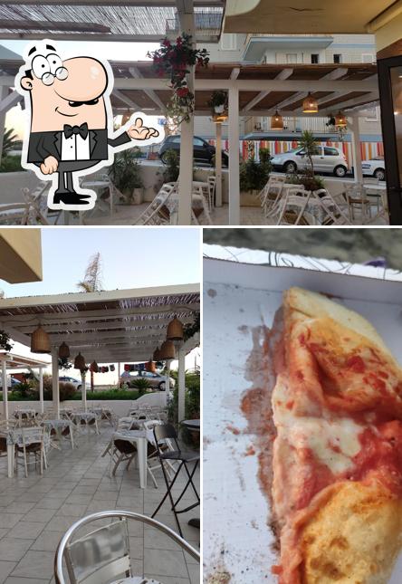 Gli interni di Già sai (pizzeria friggitoria babà)