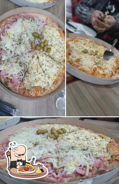 Experimente pizza no Pizzaria Adinalle