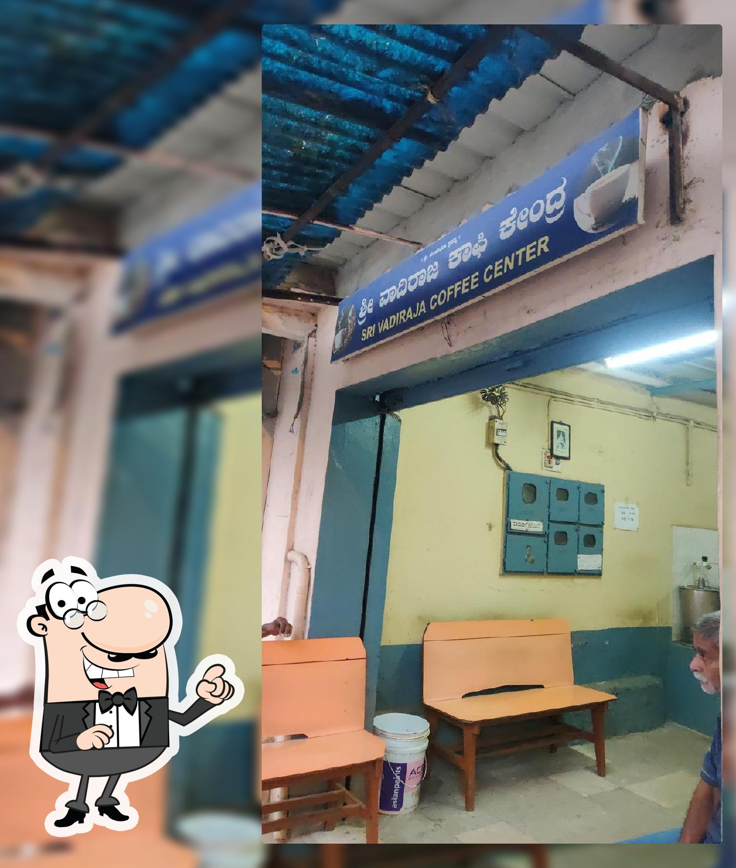 Take a seat at one of the tables at Vaadiraaja cofee kendra