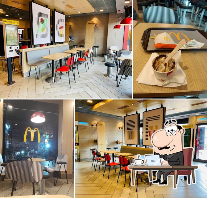Take a seat at one of the tables at McDonald's Calicut Focus Mall
