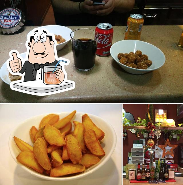 The image of drink and fries at Don Kebab Porriño