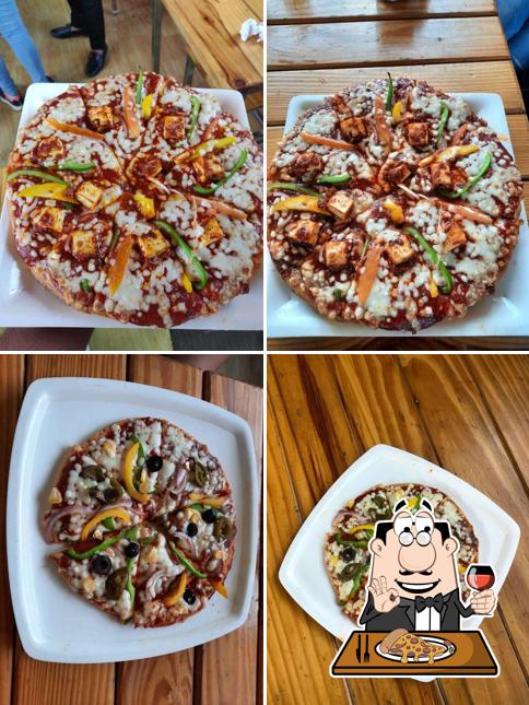 Pick pizza at Krishna Hotdog & Pizzeria