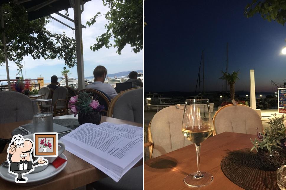 Siediti a un tavolo di Caffe Bar Gušti