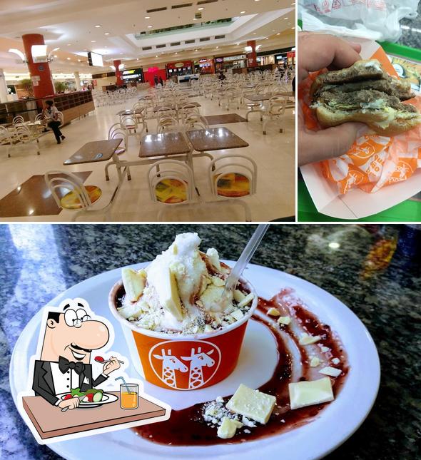 A imagem do Giraffas Carrefour Via Norte’s comida e interior