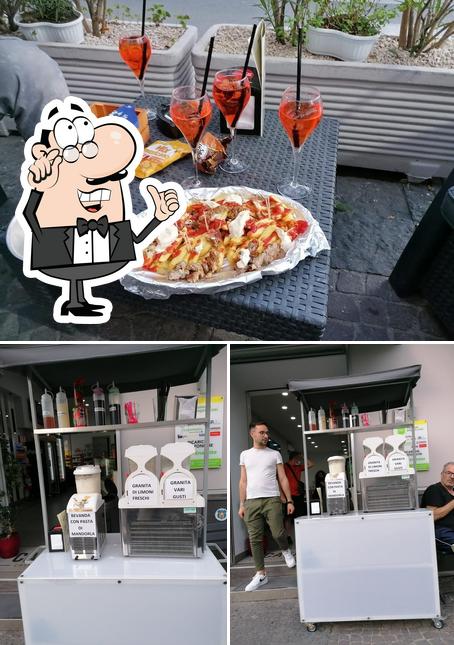 Tra le varie cose da Cafferia Coffee Bar & More - Ricevitoria SISAL e pagamenti utenze si possono trovare la interni e pizza