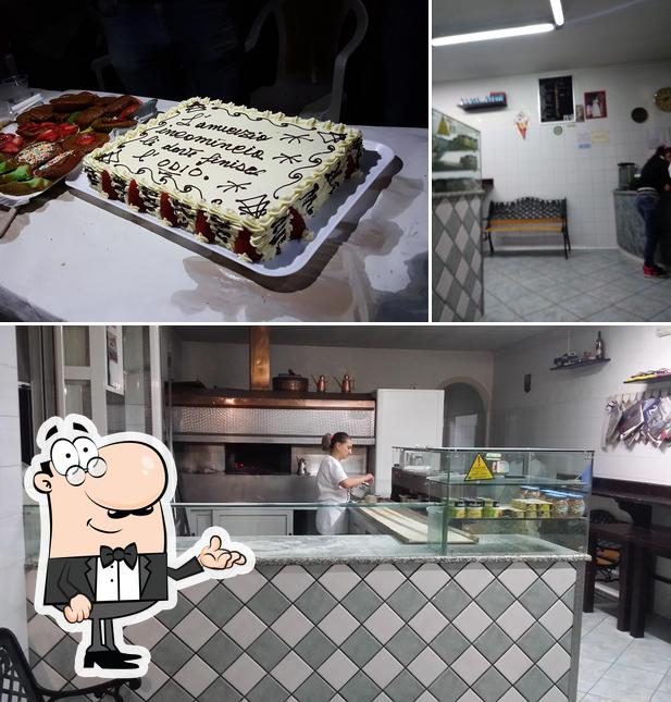 La immagine della interni e torta di Pizzeria da Franco