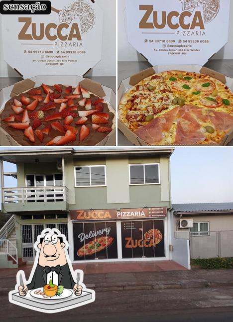 Confira a ilustração apresentando comida e interior a zucca pizzaria