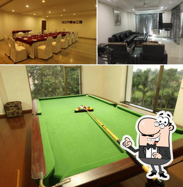 Take a seat at one of the tables at Hotel Shreshtha