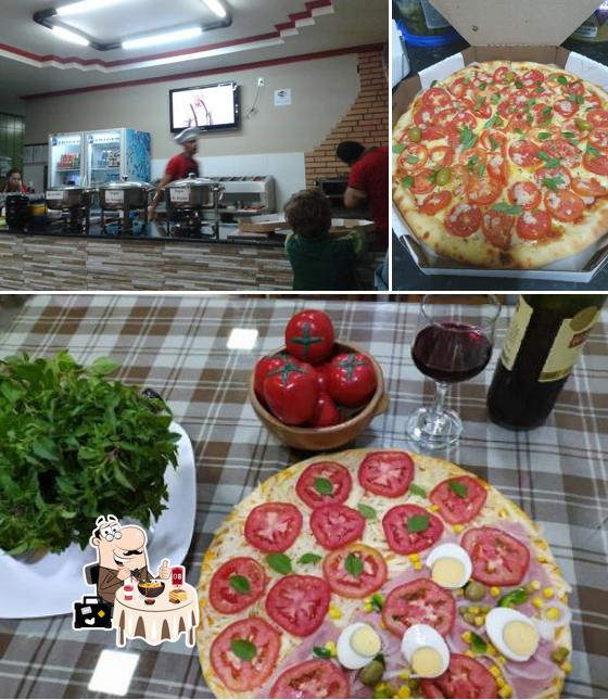 Entre diversos coisas, comida e interior podem ser encontrados a Pizza Tomatella