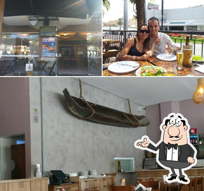A ilustração do Bene Frutos Do Mar’s interior e comida