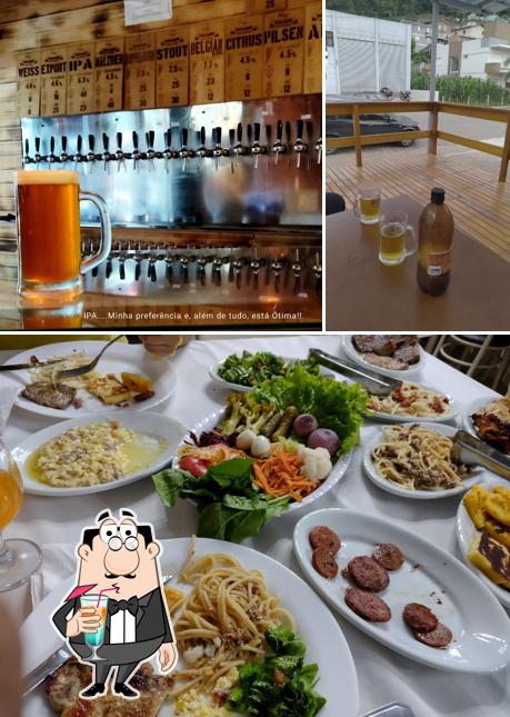 Dê uma olhada a imagem apresentando bebida e interior a Duck Beer Cervejaria