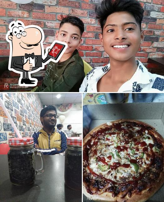 See the image of Cafe Pizza Box