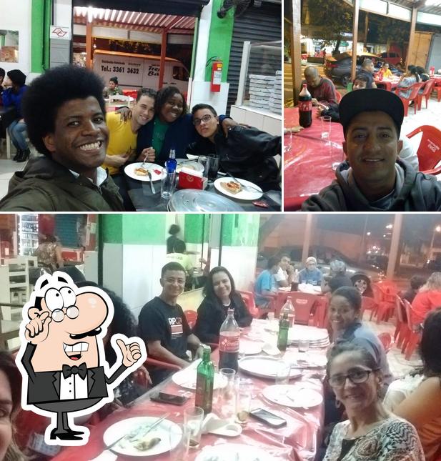 O interior do Porcoes A Pizzaria Da Familia