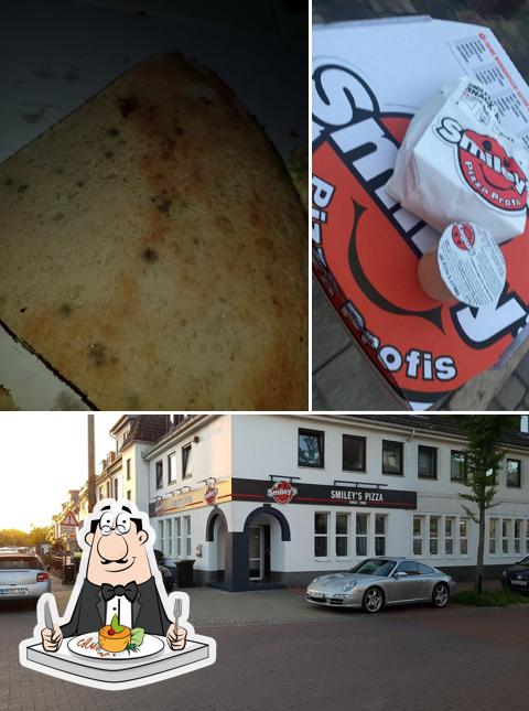The photo of food and exterior at Smiley's Pizza Profis Bremen Hastedt