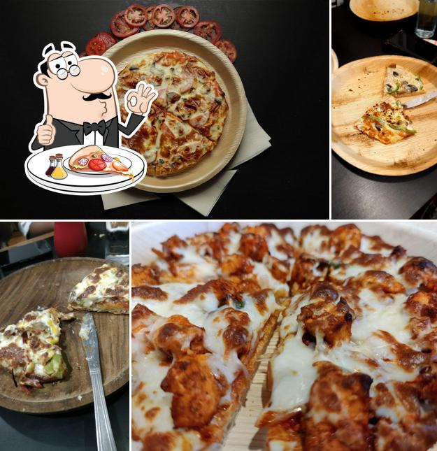 Try out pizza at Pizzaport & Cafe