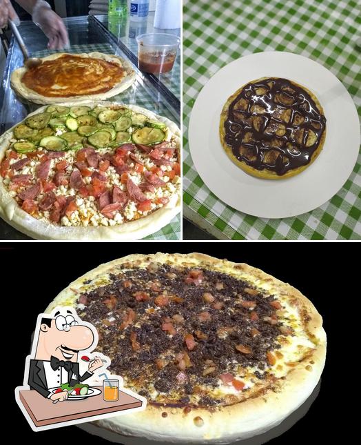 Comida em Pizza na Mão Artesanal