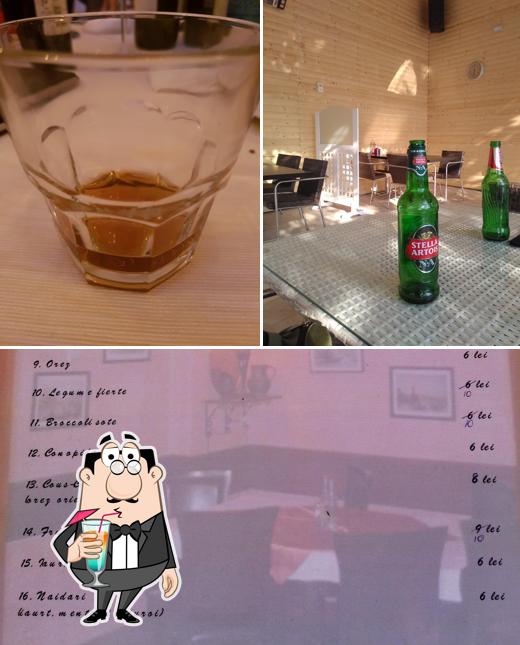 This is the image showing drink and food at Restaurant Coquette Șerif