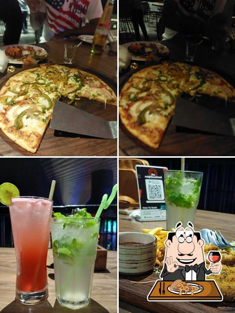 Try out pizza at The Neighbourhood Bar & Kitchen