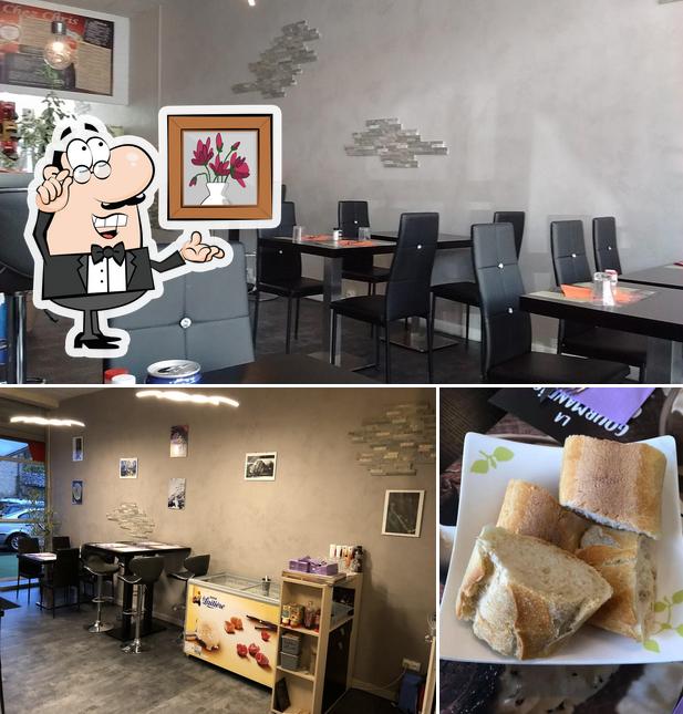 Parmi les diverses choses de la intérieur et la nourriture, une personne peut trouver sur Pizzaria snack Lisboa