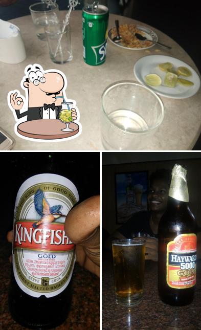 Check out the photo depicting drink and food at Golf View Bar