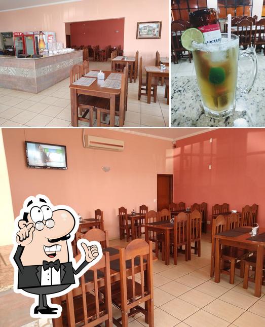 O interior do Quero Mais Mix Restaurante, Pizzaria e Lanchonete