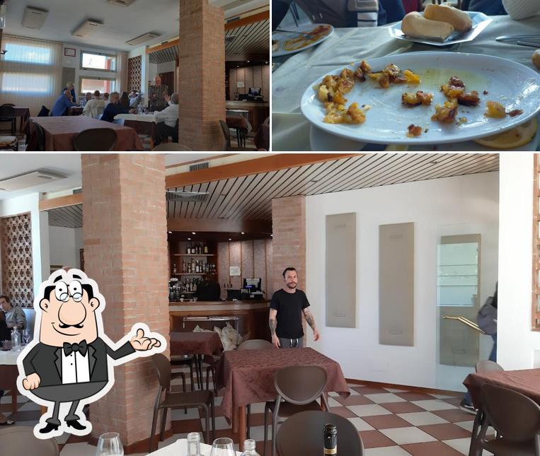 Siediti a un tavolo di Ristorante "Da Wolfango" di Rinaldi Maico