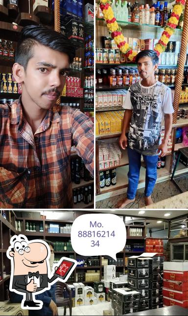 Look at the photo of GIRISH LIQUORS
