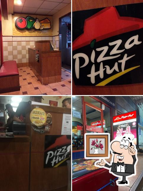 El interior de Pizza Hut 1150