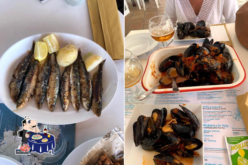 Попробуйте блюда с морепродуктами в "Chiringuito Es Bruc Santandria - Menorca"