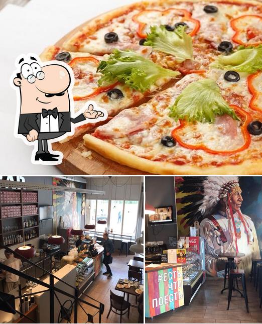 Взгляните на это фото, где видны внутреннее оформление и пицца в Lavaш&Pizza