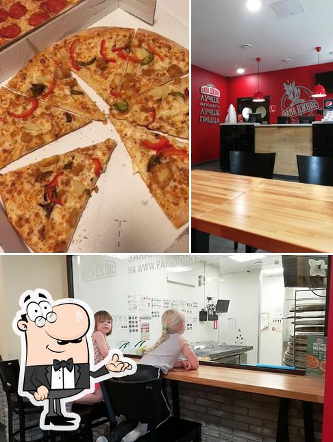 Papa Johns se distingue par sa intérieur et pizza