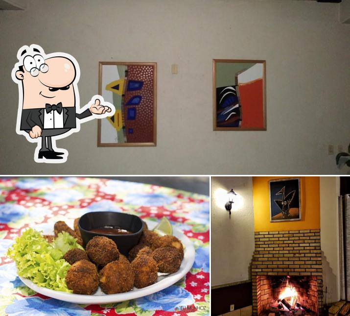 Entre diversos coisas, interior e eu no podem ser encontrados no Restaurante Hotel Pontal