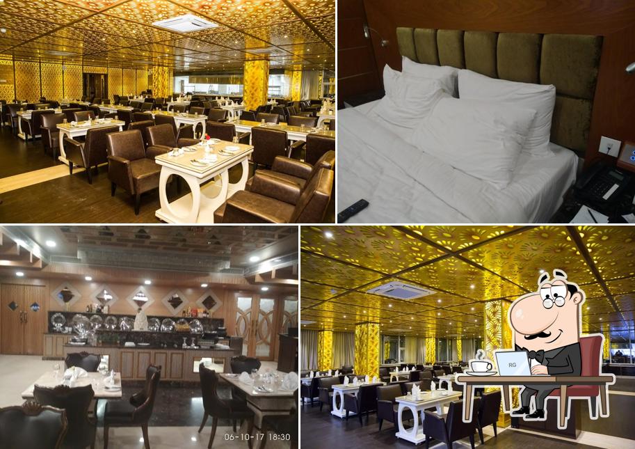 Take a seat at one of the tables at Hotel Benzz Park