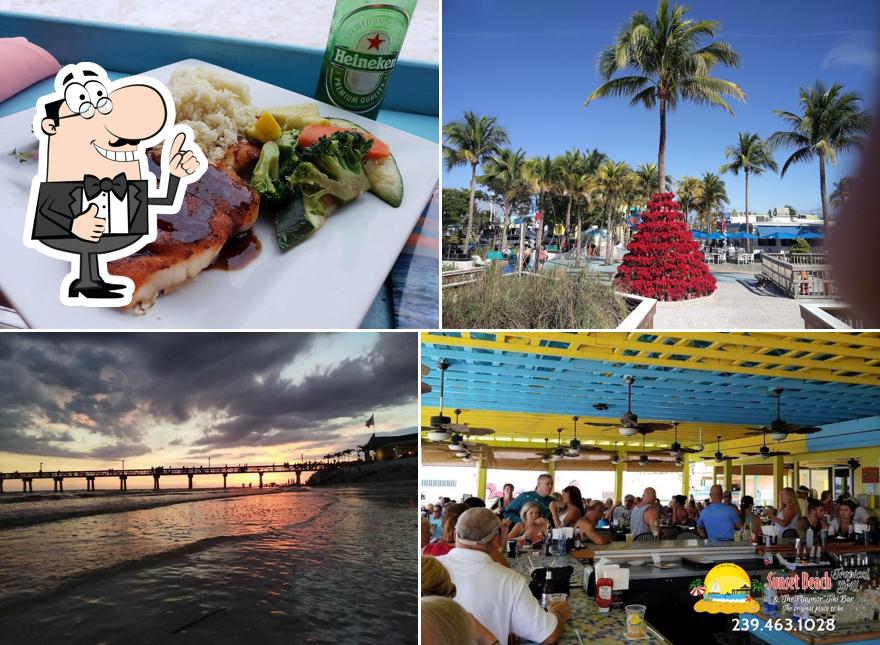 Здесь можно посмотреть изображение паба и бара "Sunset Beach Tropical Grill and The Playmore Tiki Bar"